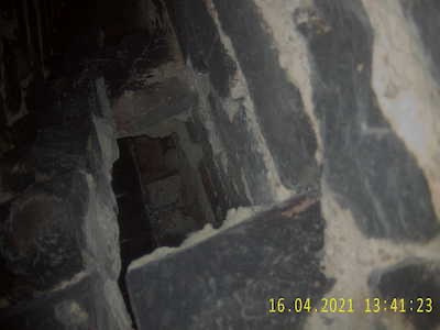 Large hole in chimney which leads into a neighbours flue.